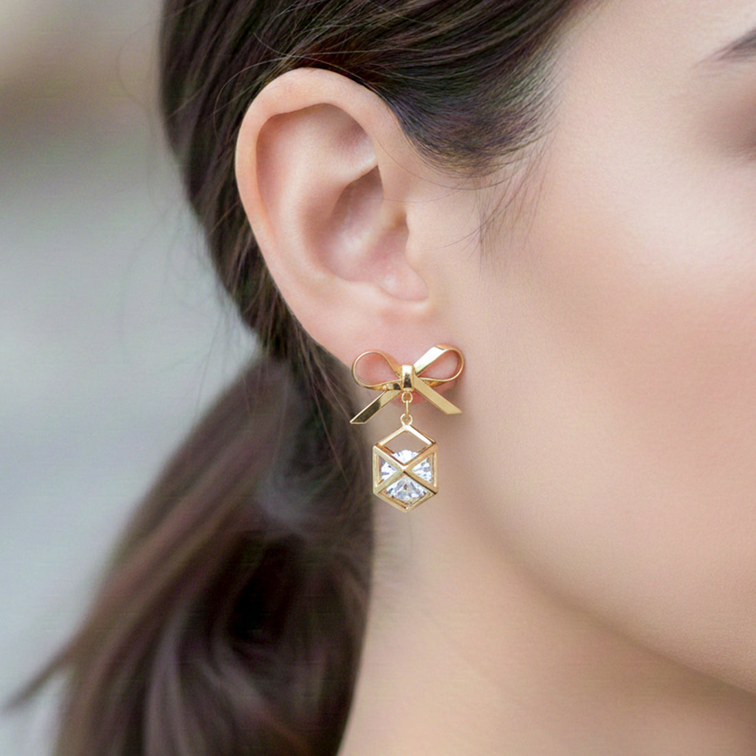 Gold-Toned Bow Cube Dangle Ear Studs GWE -110