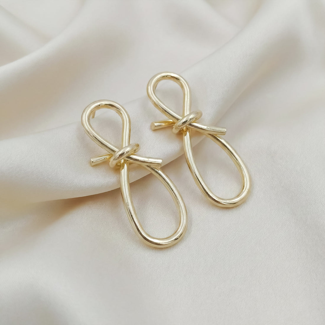 Gold Ribbon Loop Luxe Drop Drop Earrings for women - Finora Jewels