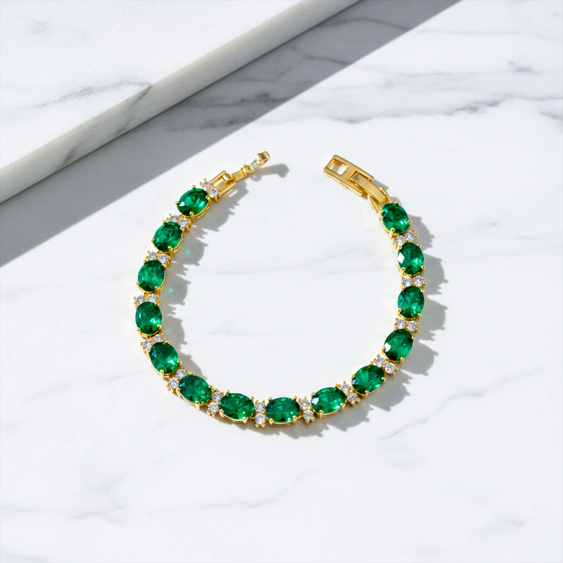 Emerald Green Oval Tennis Bracelet for women in Gold - Finora Jewels