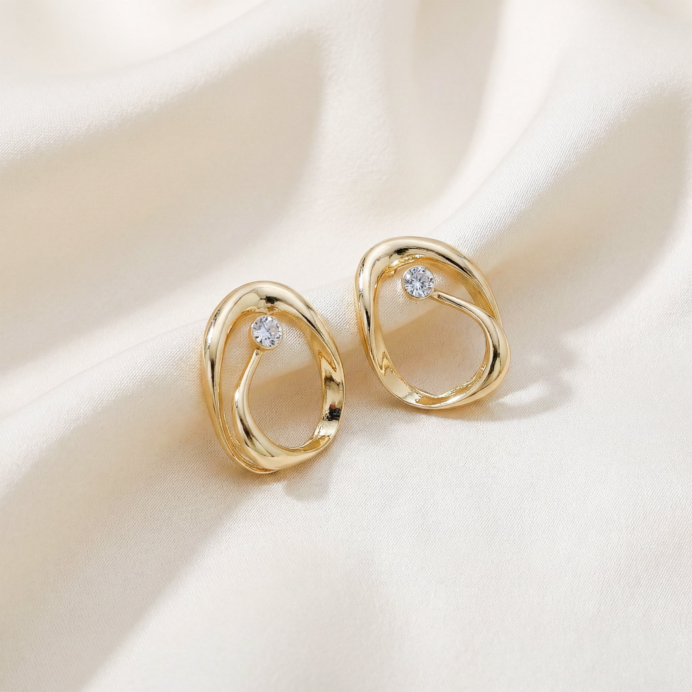 Aurelia Twist Zirconia Stone Post Ear Studs GWE -51
