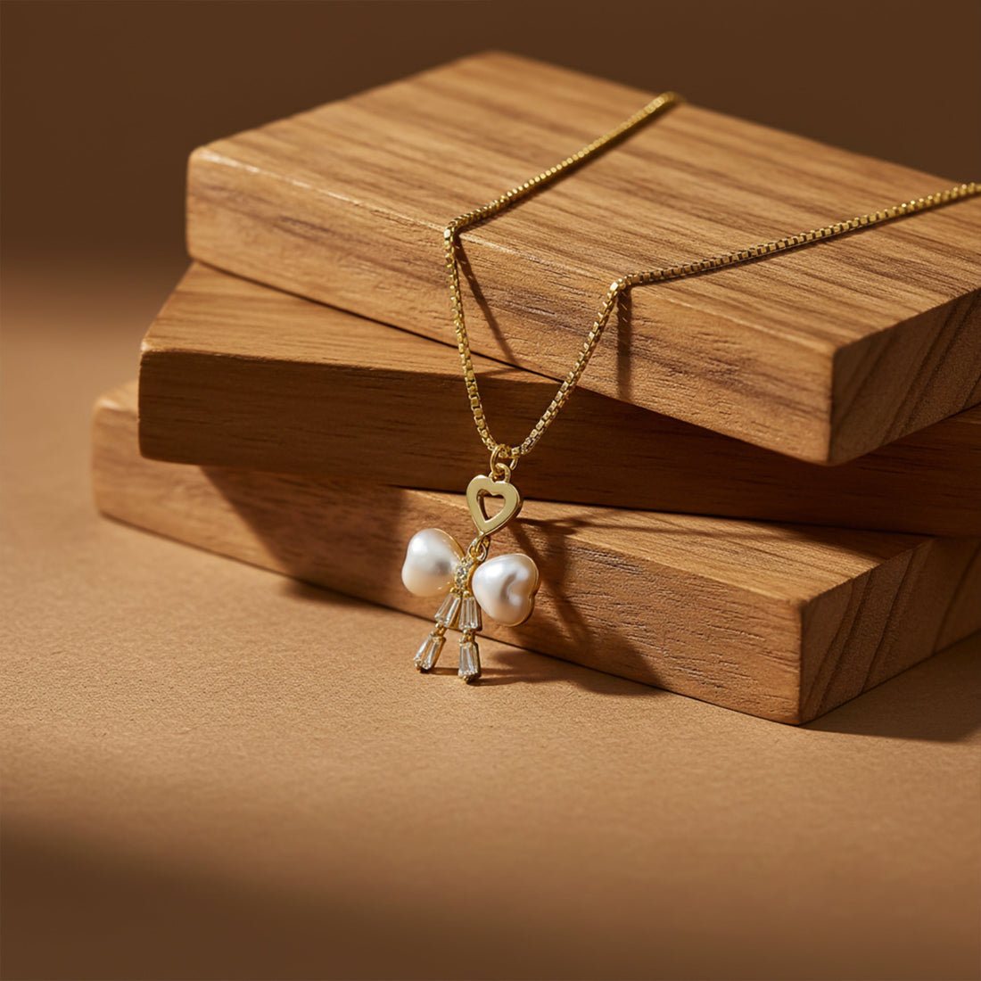 Gold-Toned Moti Bow Love Locket Link Set GWN -51