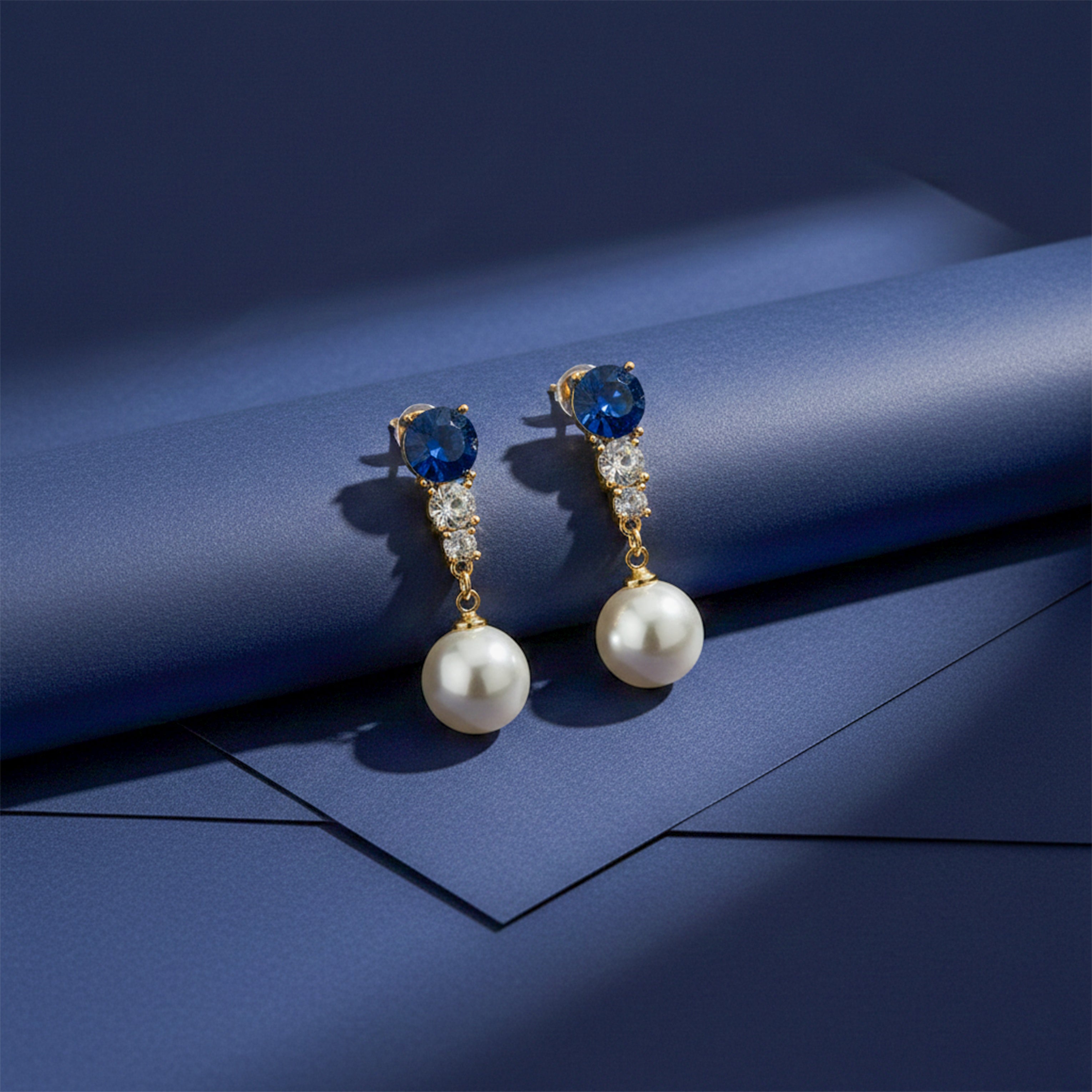 Blue Crystal & Pearl Drop Stud Earrings for women in Gold - Finora Jewels